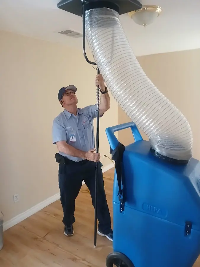 Mini Split Installation technician using HEPA equipment in Eugene